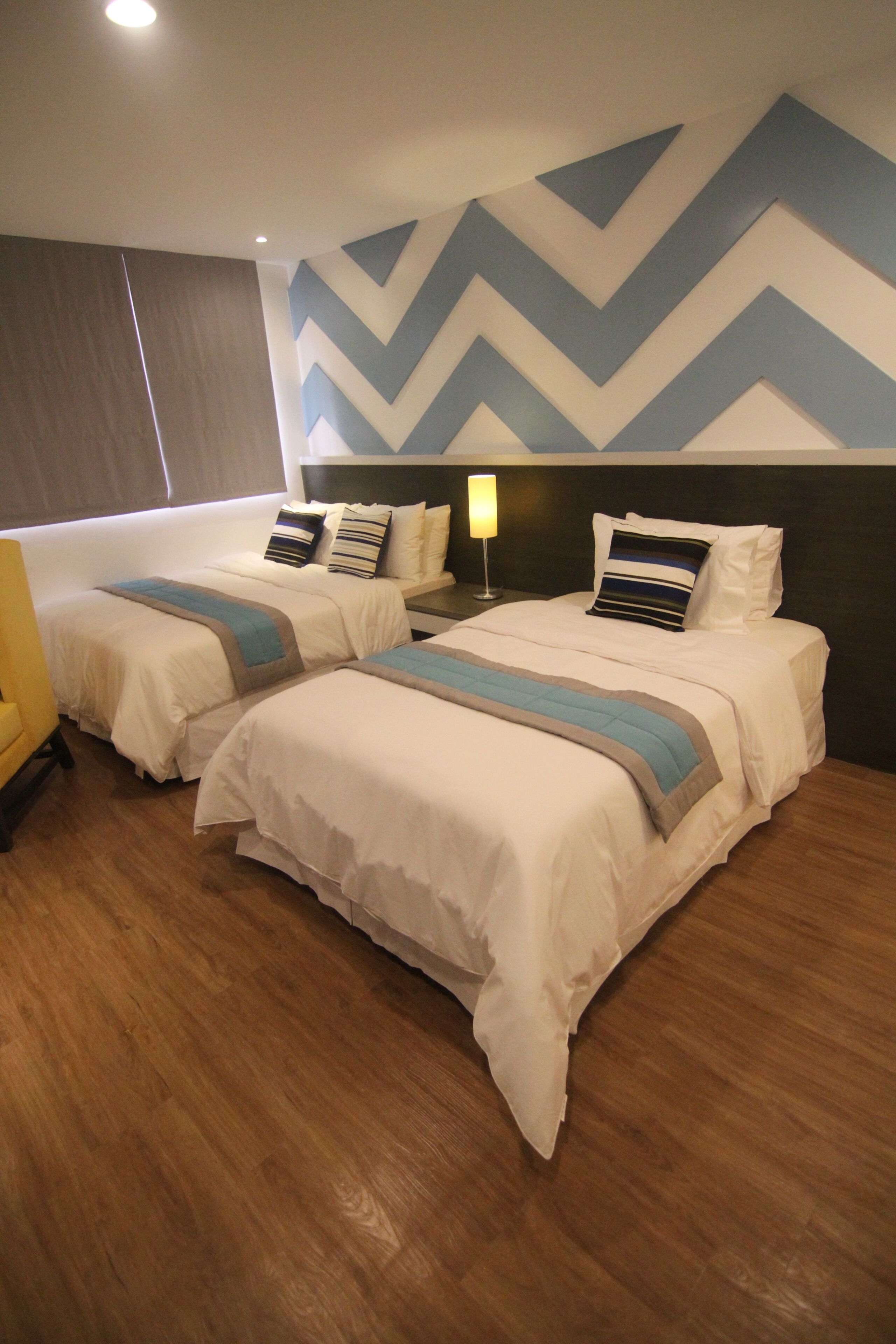Deluxe Triple Room, City View | Desk, laptop workspace, free WiFi