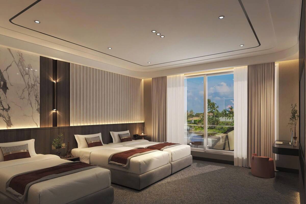 A modern hotel room with two beds, a large window with a view, and a balcony.