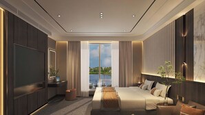 A modern hotel room with a large bed, a sofa, a TV, and a view of the outdoors. - Doris Grand Cruise (Ha Long)