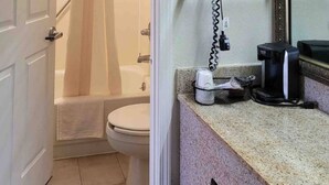 A bathroom with a toilet, a shower, a coffee maker, and a towel rack.
