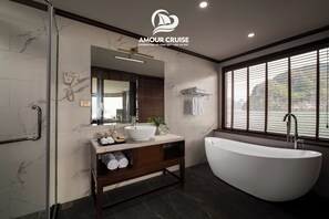 Separate tub and shower, hair dryer, slippers, towels - Amour Cruise (Tuan Chau)