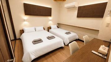 Desk, iron/ironing board, free WiFi, bed sheets