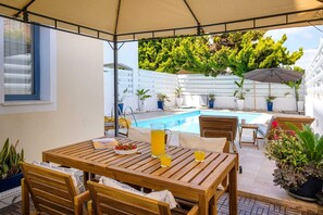 Outdoor dining - Helia Holiday Home by Nomads (Paphos)