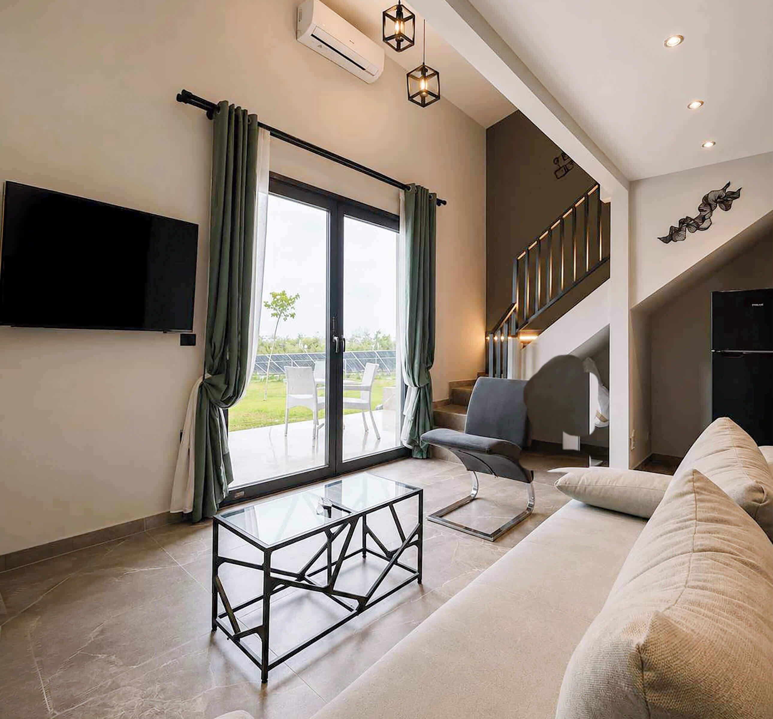 Bright and modern living area with direct access to the patio area and plenty of natural light throughout the day.