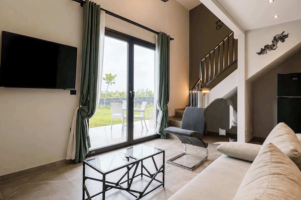 Bright and modern living area with direct access to the patio area and plenty of natural light throughout the day.