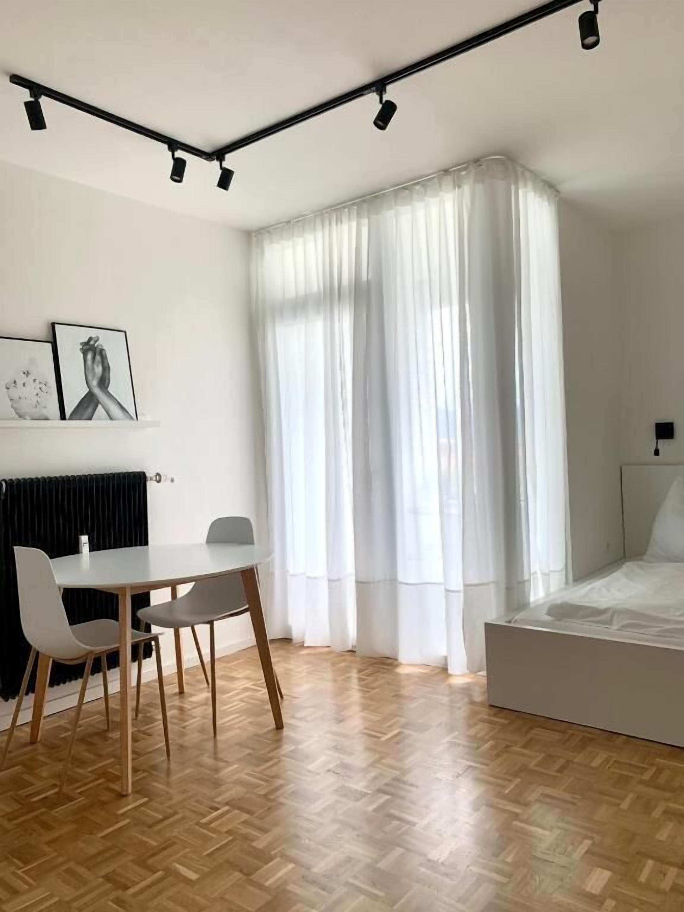 Comfort Studio, 1 Queen Bed, Balcony | Living area | 50-inch flat-screen TV with cable channels