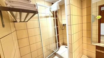 Comfort Quadruple Room | Bathroom | Separate tub and shower, towels, soap, shampoo
