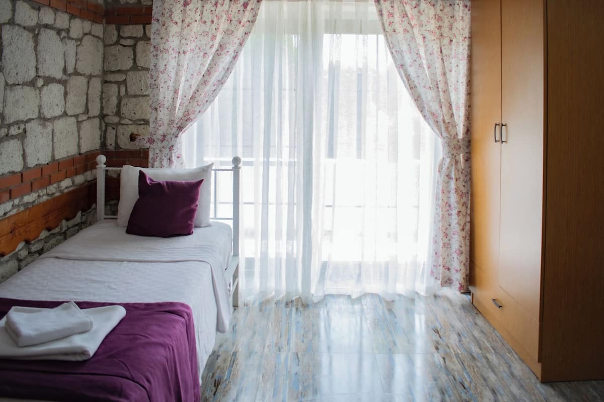 Standard Triple Room, Pool View | Desk, free WiFi