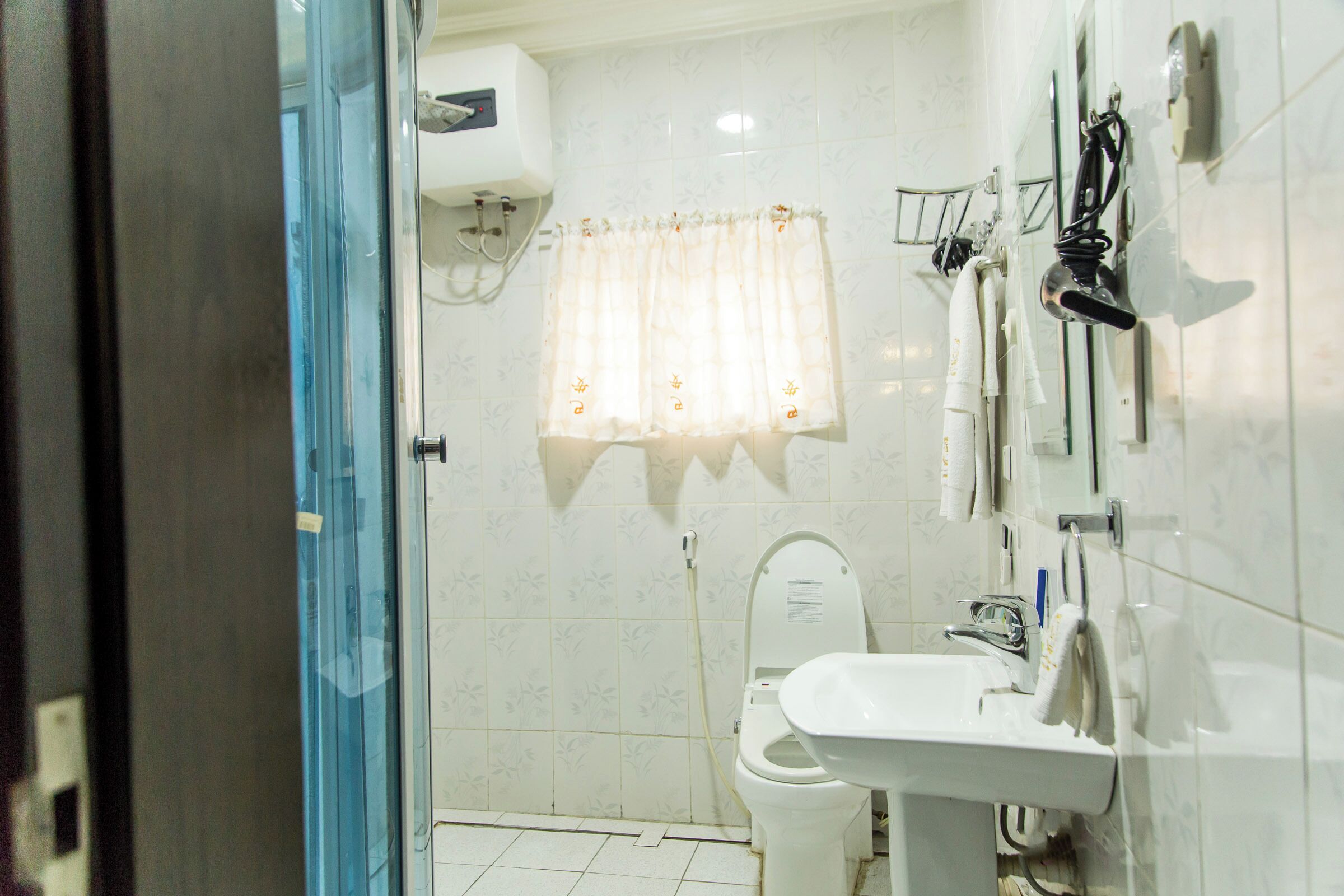 Hair dryer, towels, soap, shampoo