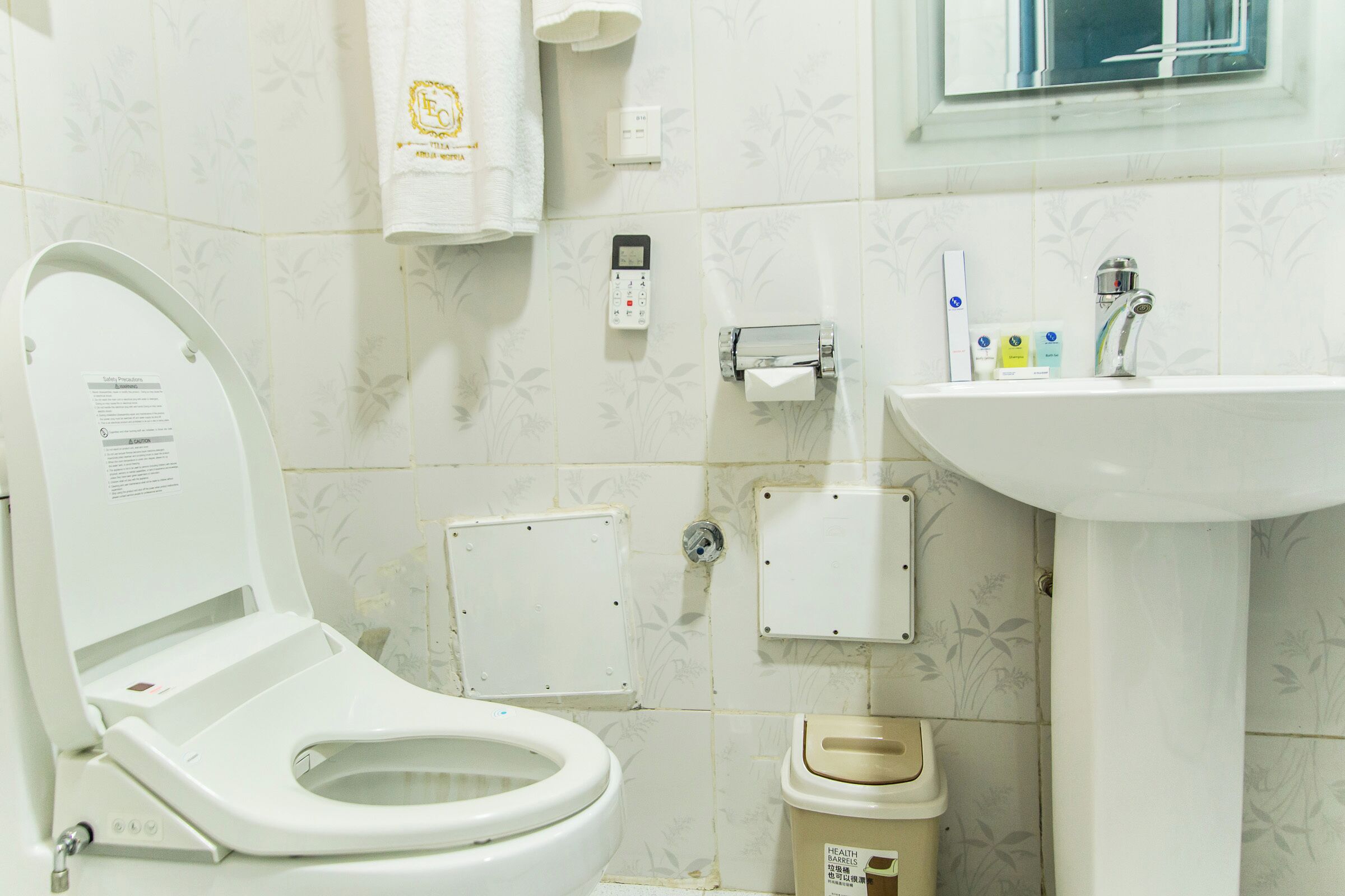 Hair dryer, towels, soap, shampoo