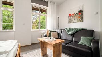 Iron/ironing board, travel crib, free WiFi, bed sheets