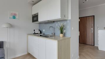 Studiosuite, Balkon | Eigene Kochnische