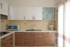Apartment, 1 Bedroom, Balcony | Private kitchen - Sa Pintadera by Wonderful Italy (Olbia)