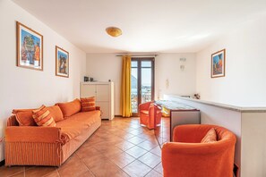 Apartment, 1 Bedroom, Balcony, Sea View | Living area | 30-inch TV with satellite channels - Gem of Mondello by Wonderful Italy (Palermo)