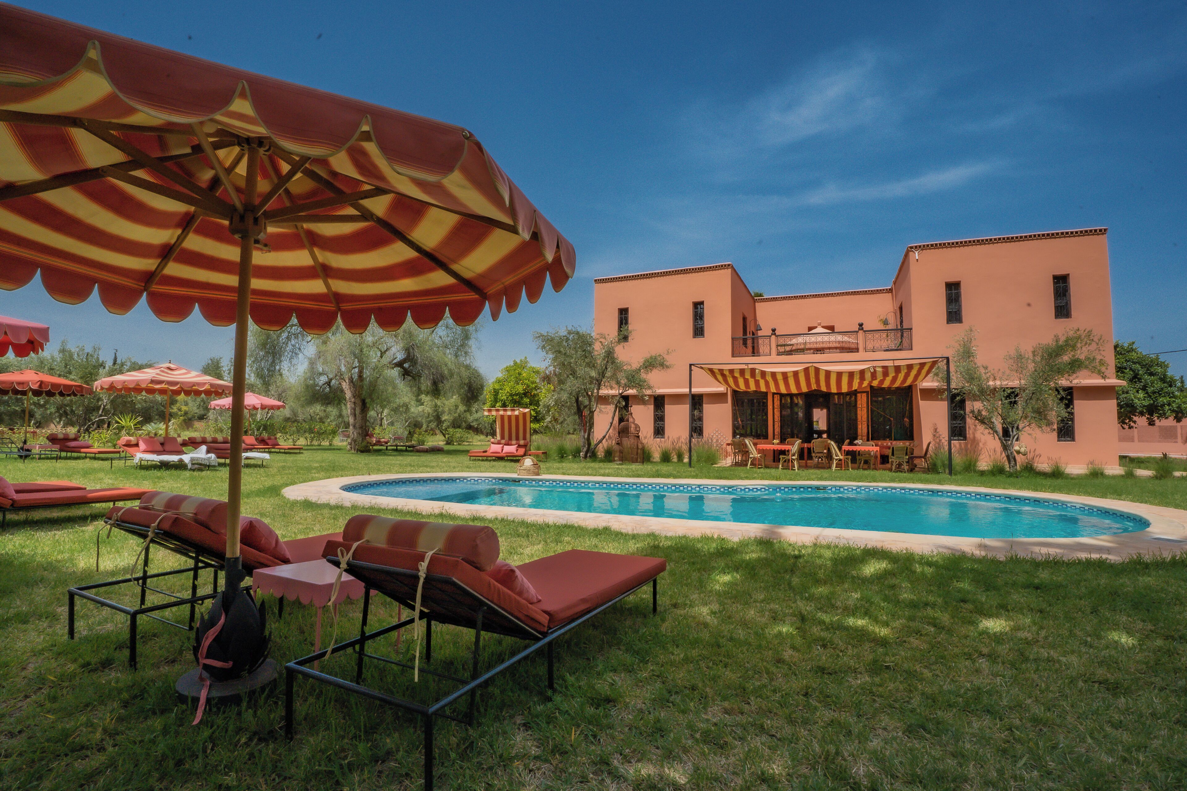 Outdoor pool, pool umbrellas, pool loungers
