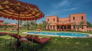 Outdoor pool, pool umbrellas, pool loungers