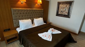 Double or Twin Room, City View | In-room safe, desk, laptop workspace, blackout drapes