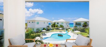 Oceans 9, Villa 8: Lazy River Pool, Sunken BBQ Lounge + Designer Interiors in West Bay