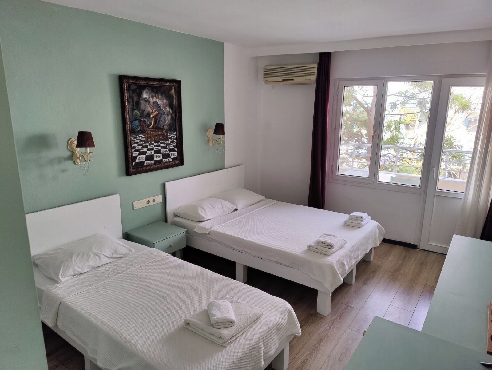 Classic Quadruple Room, Balcony, City View | Free WiFi