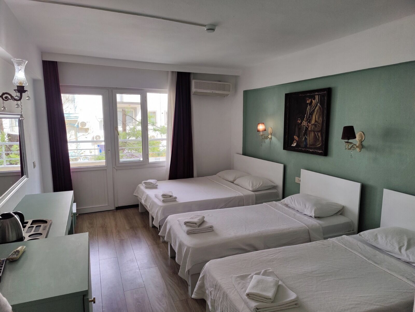 Classic Quadruple Room, Balcony, City View | Free WiFi