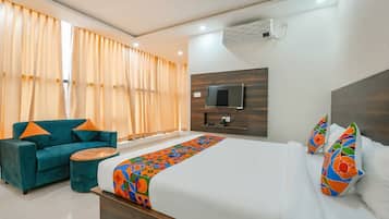 Deluxe Double Room, City View | Desk, blackout drapes, iron/ironing board, free WiFi