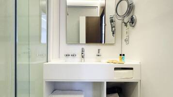 Shower, hair dryer, slippers, towels