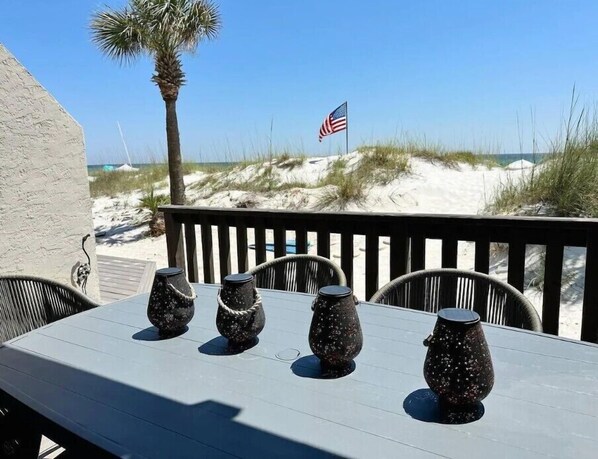 Outdoor dining - beachfront townhome located directly on the sand in a private gated community (Panama City Beach)