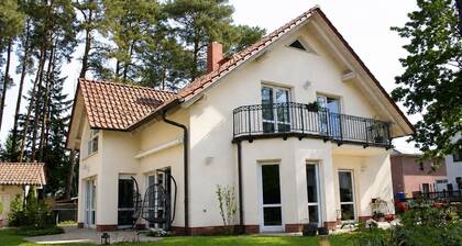Beach Villa with Private Apartment – King Beds, Wellness & Lakes for up to 14 Guests