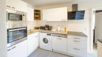 Appartement, 2 chambres, patio, vue ville | Cuisine privée