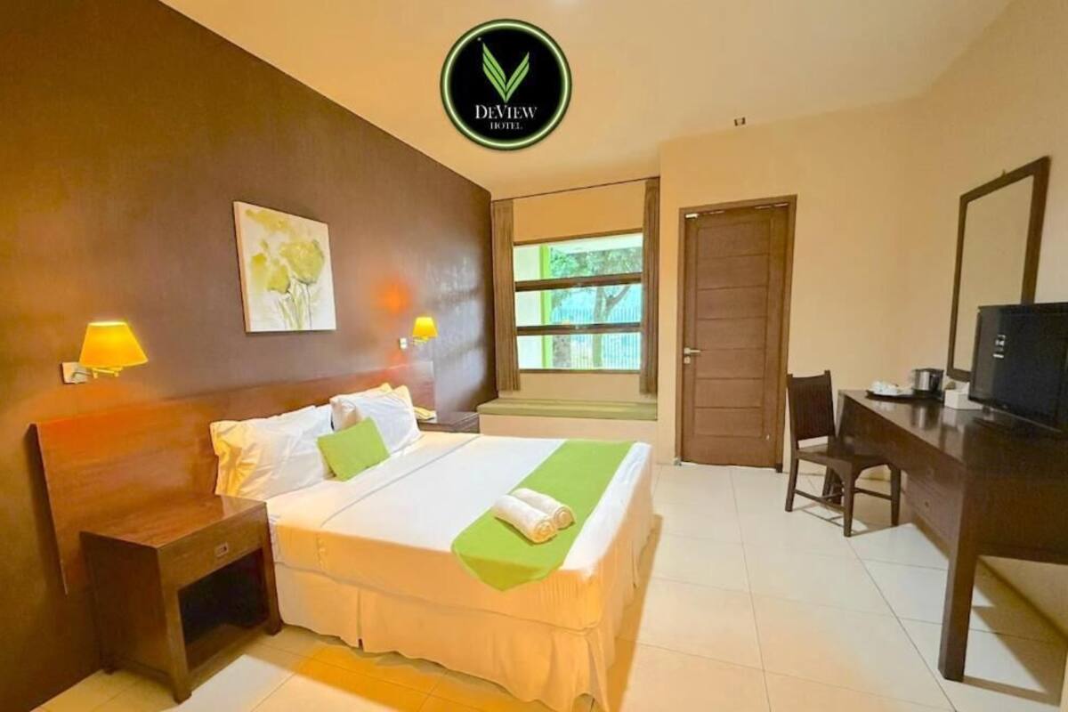 Chambre Deluxe, 1 très grand lit | Chambres insonorisées, Wi-Fi gratuit