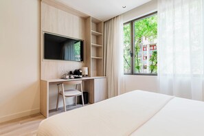 Habitación estándar doble | Ropa de cama hipoalergénica, minibar, caja fuerte