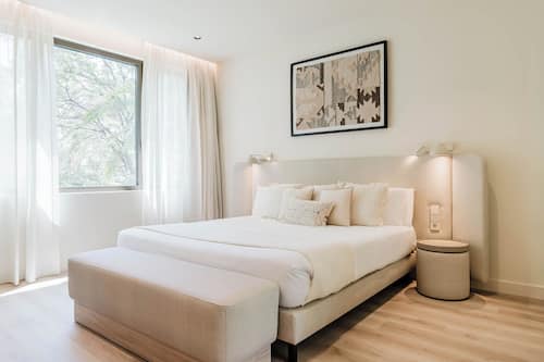 Habitación Deluxe doble, vistas al jardín | Ropa de cama hipoalergénica, minibar, caja fuerte