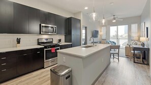 Fridge, dining tables - Landing | Chic 2BD, Yoga Studio, Gym (Las Vegas)