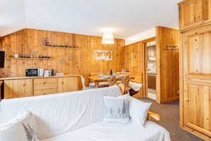 Apartment, 1 Bedroom, Mountainside | Living area | 27-inch Smart TV with digital channels