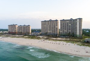 A beachfront hotel with multiple high-rise buildings, a sandy beach, and ocean views. - Avalon Penthouse 4 - Top of the Tower Luxury! Beach Club - 5/5 Double Mstr (Gulf Shores)