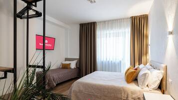 Triple Room | Iron/ironing board, free WiFi