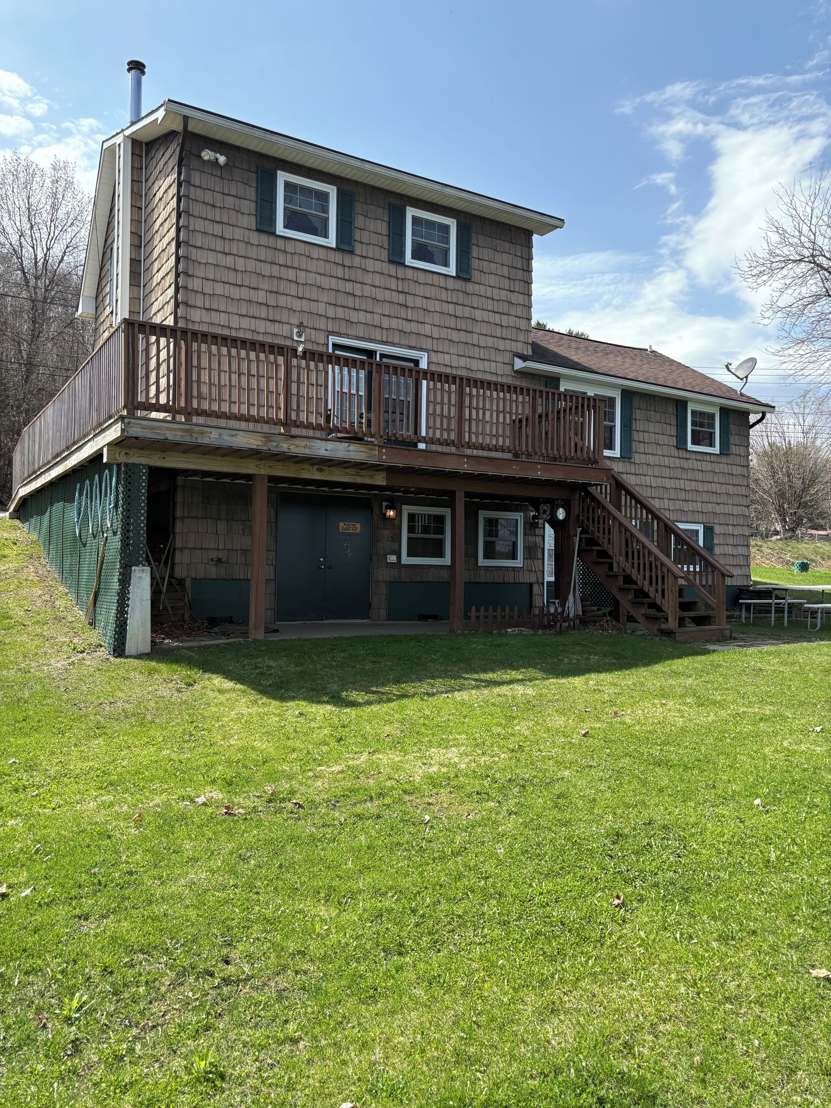 Back Deck with large lawn area