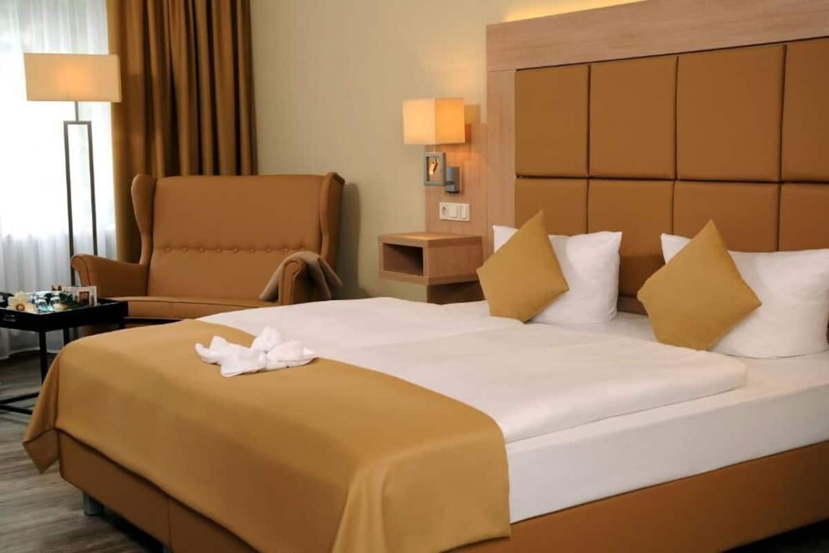 Deluxe Room, Garden View | In-room safe, soundproofing, free WiFi, wheelchair access