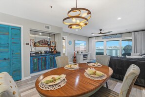 Dining - 🚲 Bouchelle Island 202 | Intracoastal Views | Screened Porch & Beach Cruisers (New Smyrna Beach)