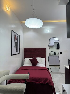 Deluxe Apartment, Balcony, City View | In-room safe, desk, laptop workspace, blackout drapes - Pearlsend Apartment (Lagos)