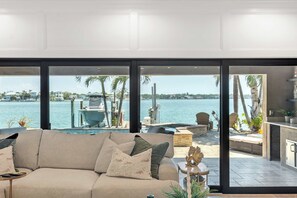 TV, fireplace - Harbor Villa | Waterfront Pool & Spa | Firepit (Indian Rocks Beach)