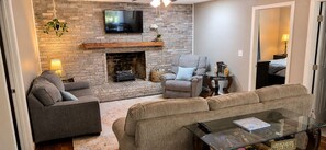 Smart TV, fireplace, books