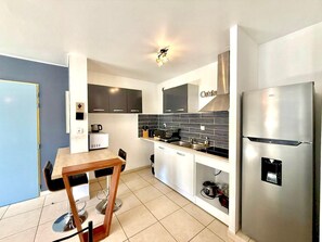 Fridge, microwave, coffee/tea maker, toaster