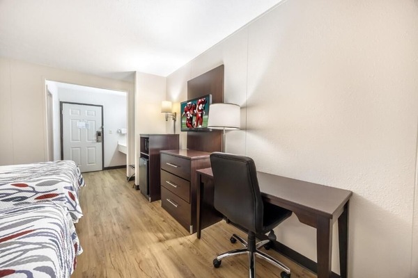 Get work done comfortably at the dedicated desk workspace.