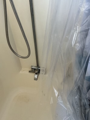 Shower, towels, soap, toilet paper
