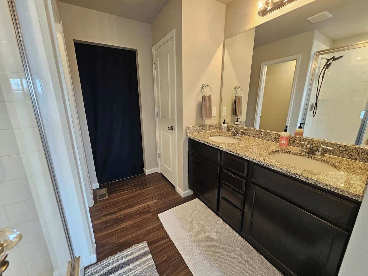 Shower, hair dryer, towels, shampoo