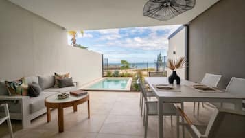 Family Duplex, Balcony, Beach View | Outdoor dining