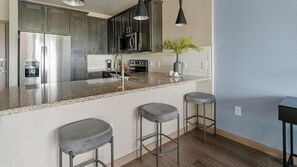 Fridge, dining tables - Landing | Amazing 1BD in Bellview Acres Whiting (Baytown)
