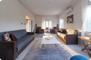 Family Villa, Patio, Garden View | Living area