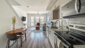 Fridge, dining tables - Landing | Beautiful 1BD, Clubhouse (Austin)